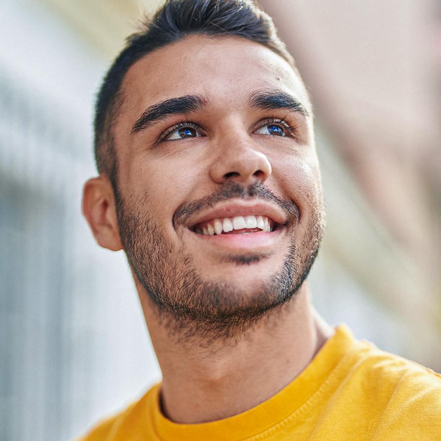 Man smiling with white teeth in Sacramento